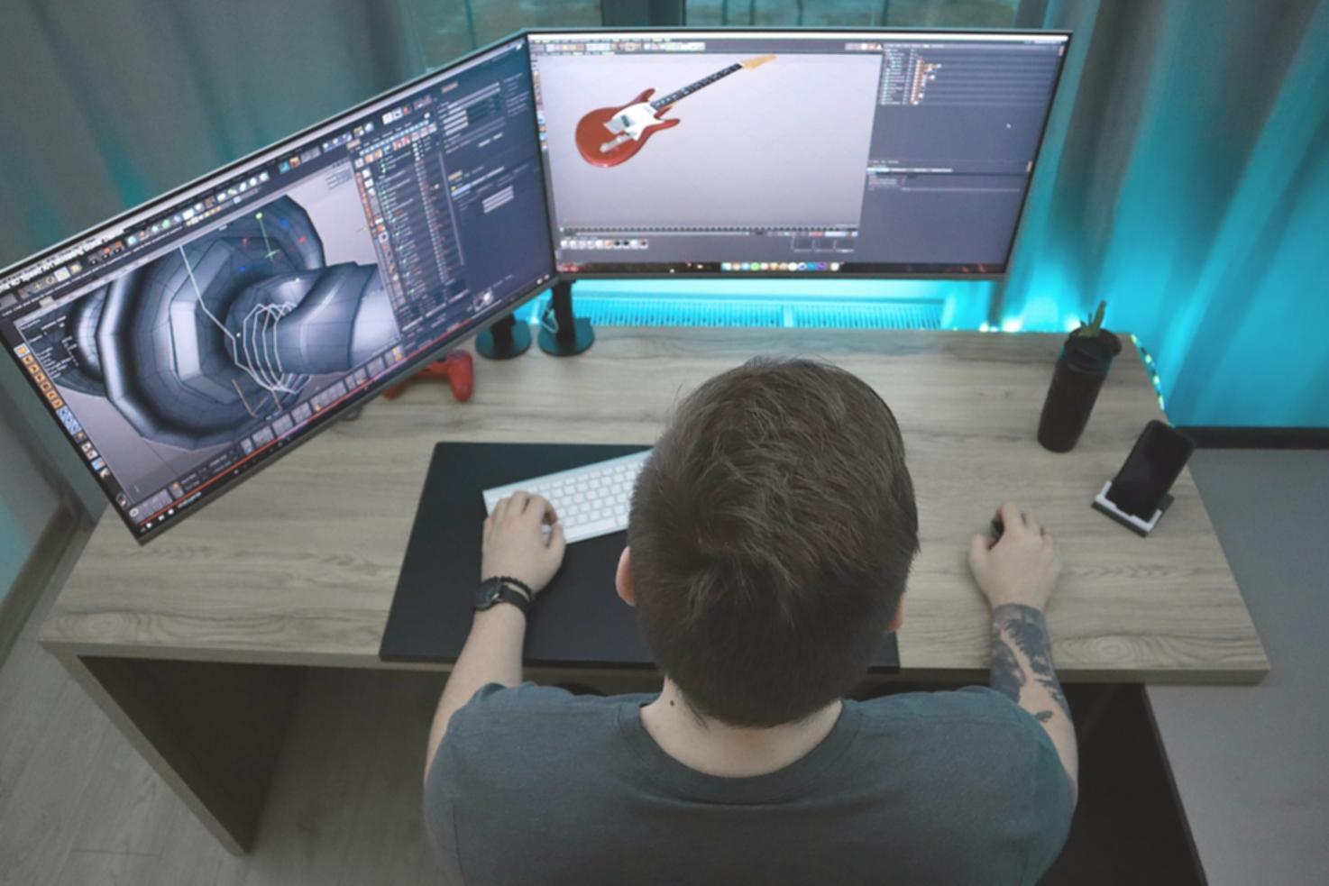 Student working on GraphQL development project at computer workstation
