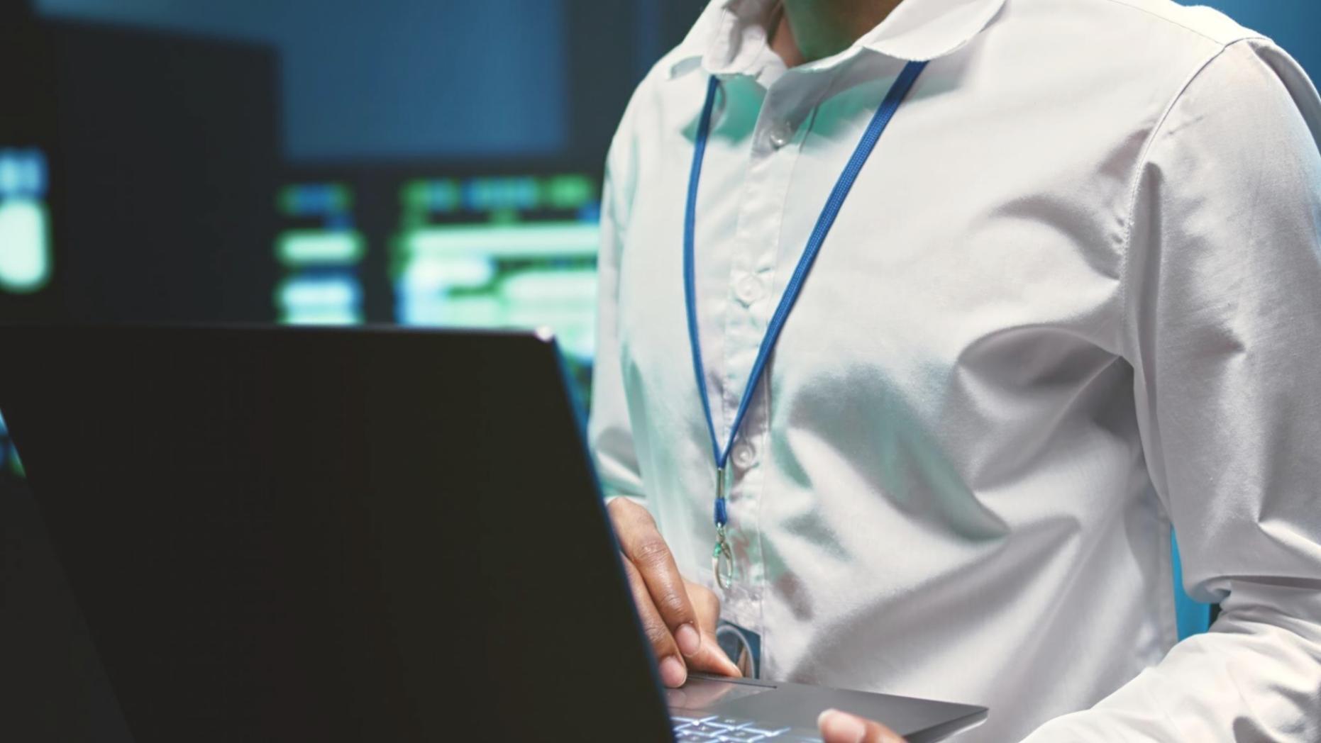 Professional development team collaborating on GraphQL API architecture in modern office environment